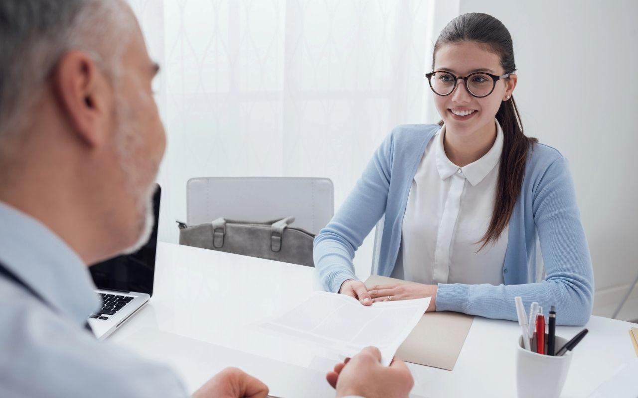 20 First Job Interview Questions & Sample Answers: Tips to Land Your First Job