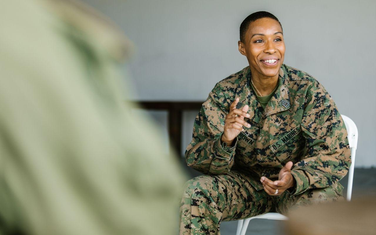 Us Marine In Uniform Talking In Meeting